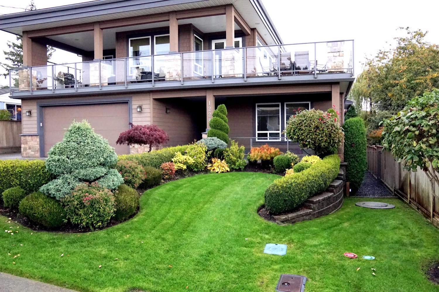 Terraced planting beside a house
